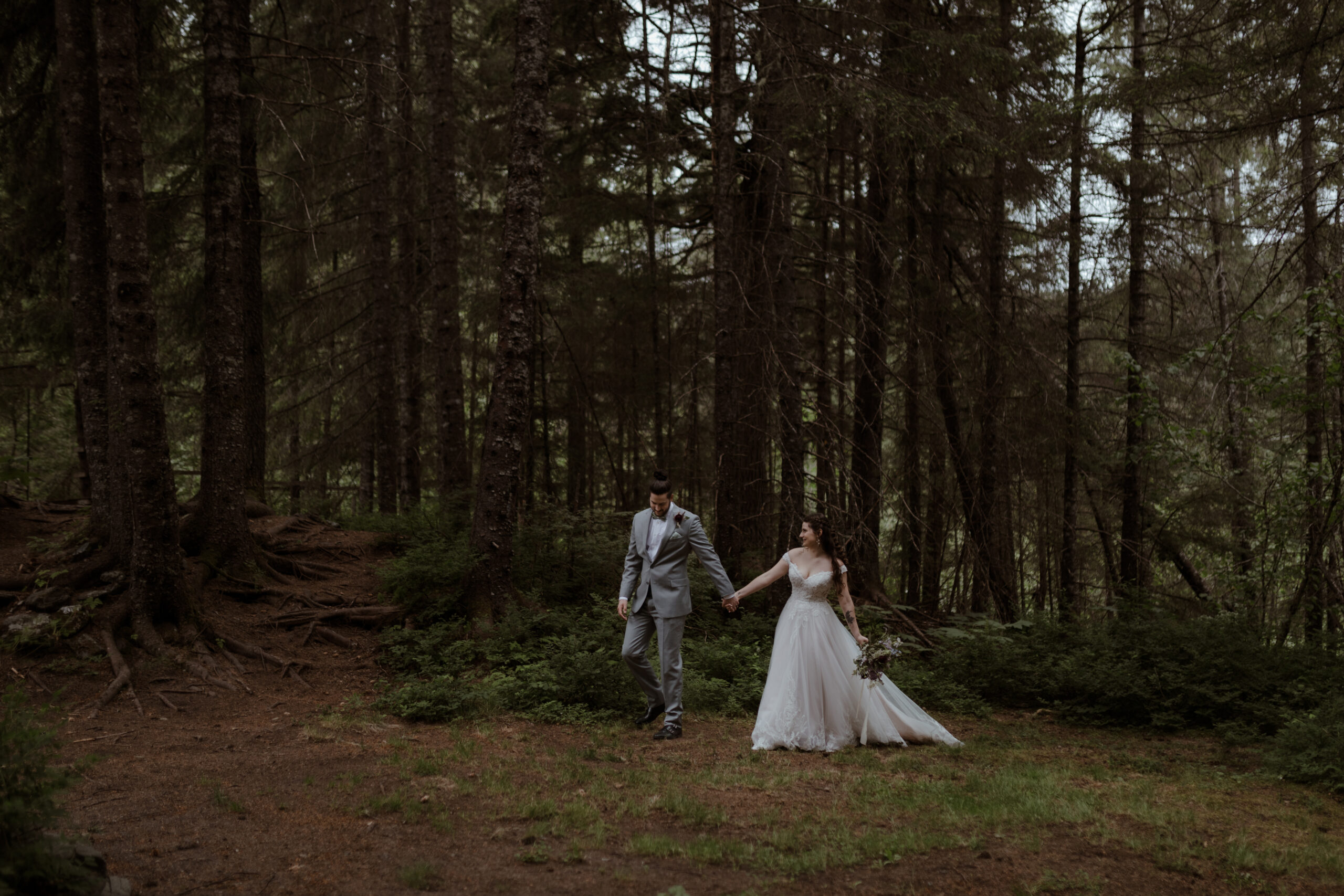 Bride and groom walking at Alaska Wedding Venue in Alaska